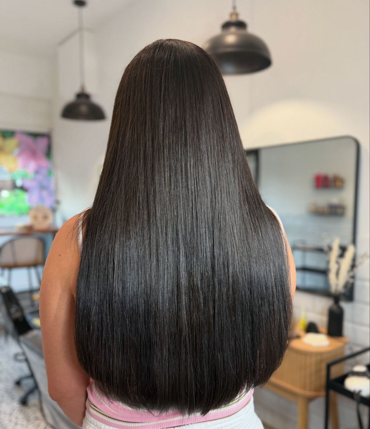 Long sleek dark hair with extensions