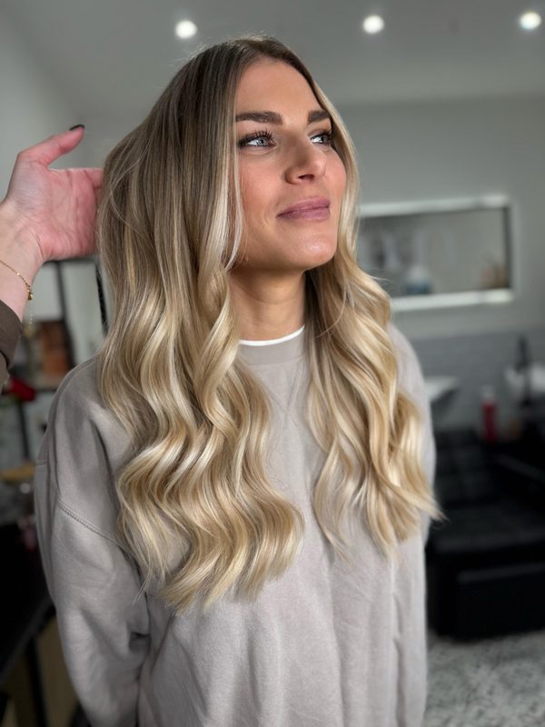 Blonde waves with a darker root, by Holly